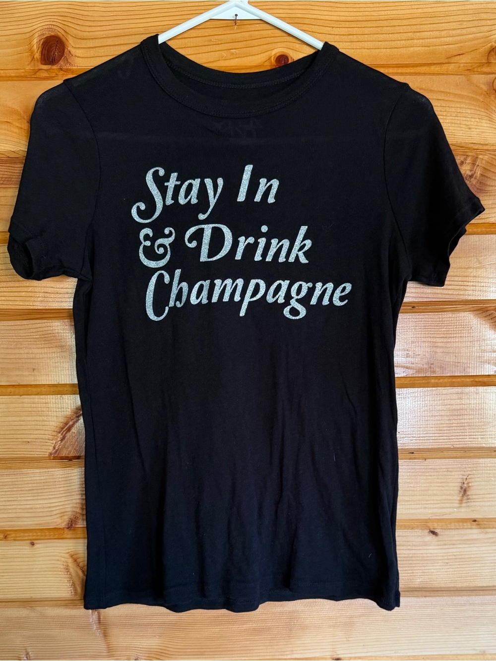 Chaser Black Tee with Silver 'Stay In & Drink Champagne' Script